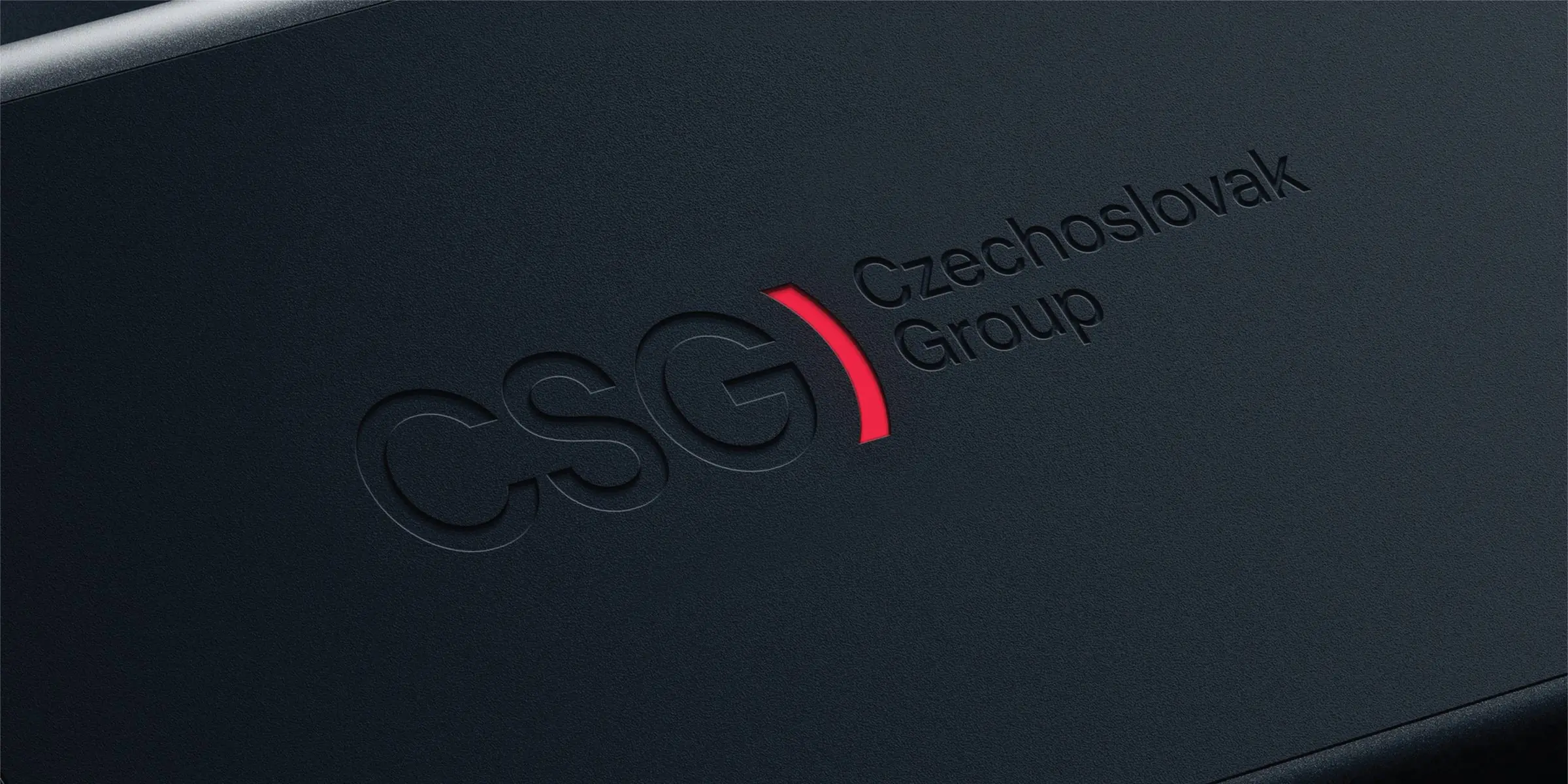 CSG logo embossed on a dark plate