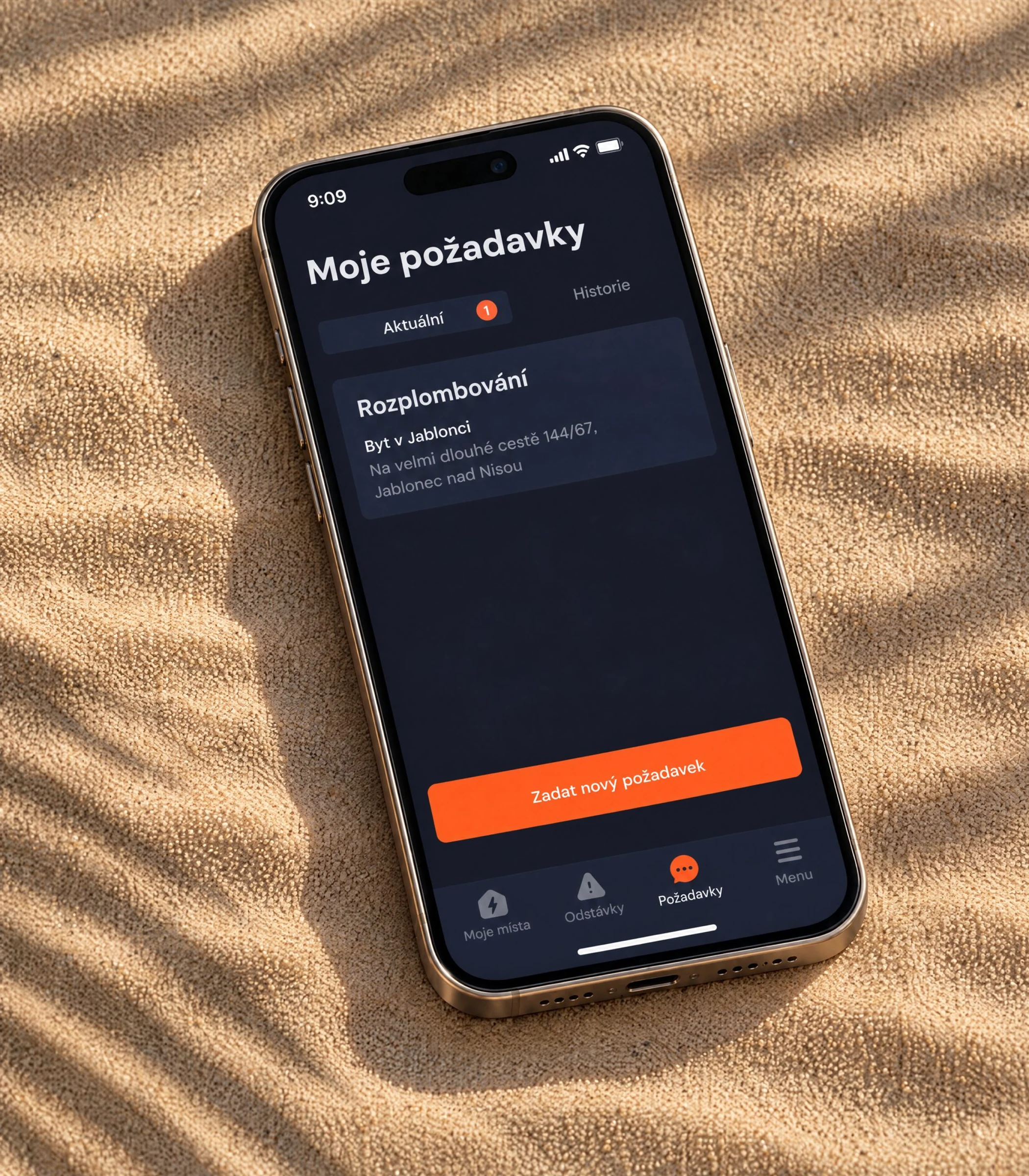 Phone lying on sand showing the list of the customer's requests